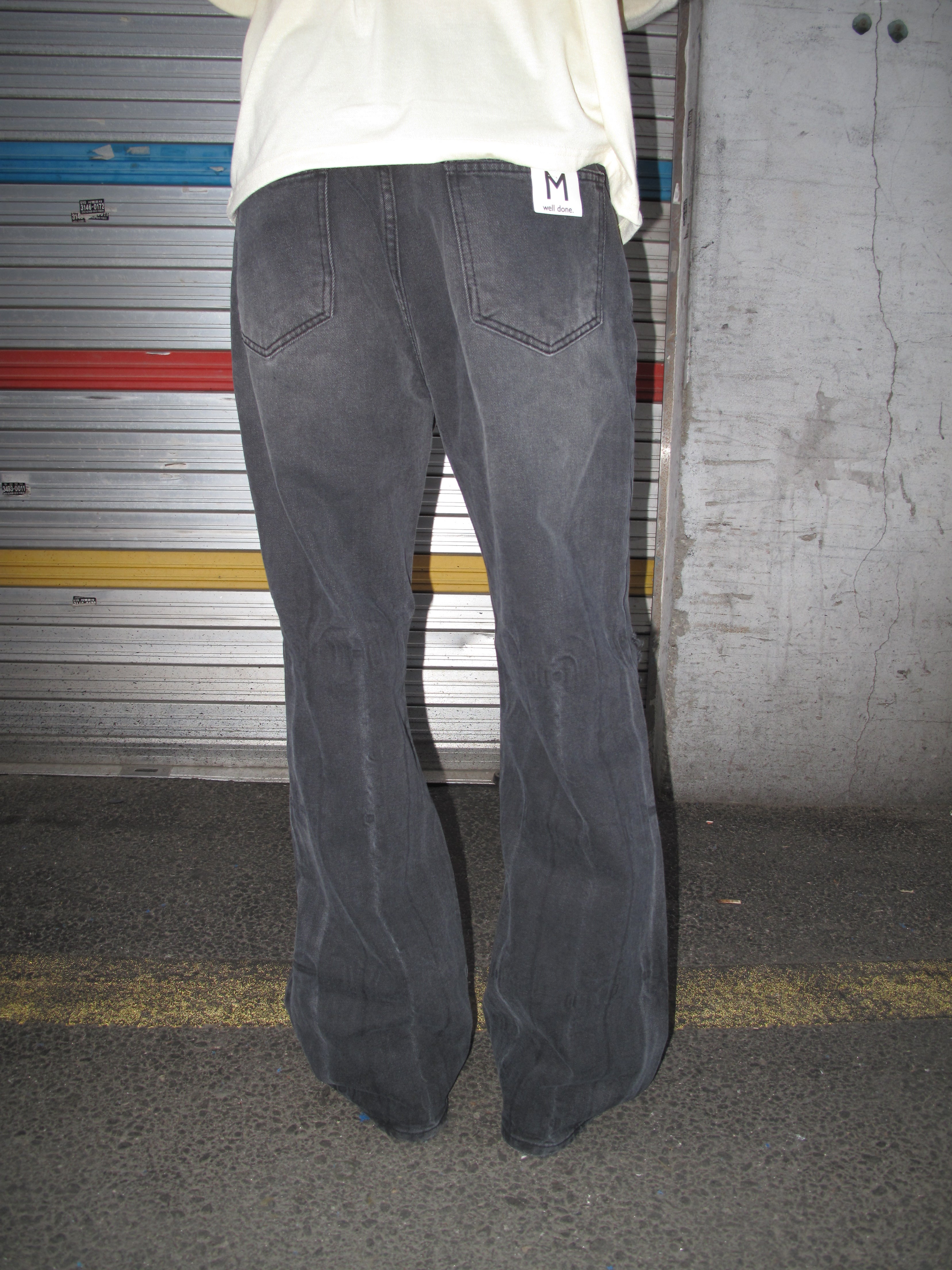 Distressed Washed Black Wide-Flare Jeans