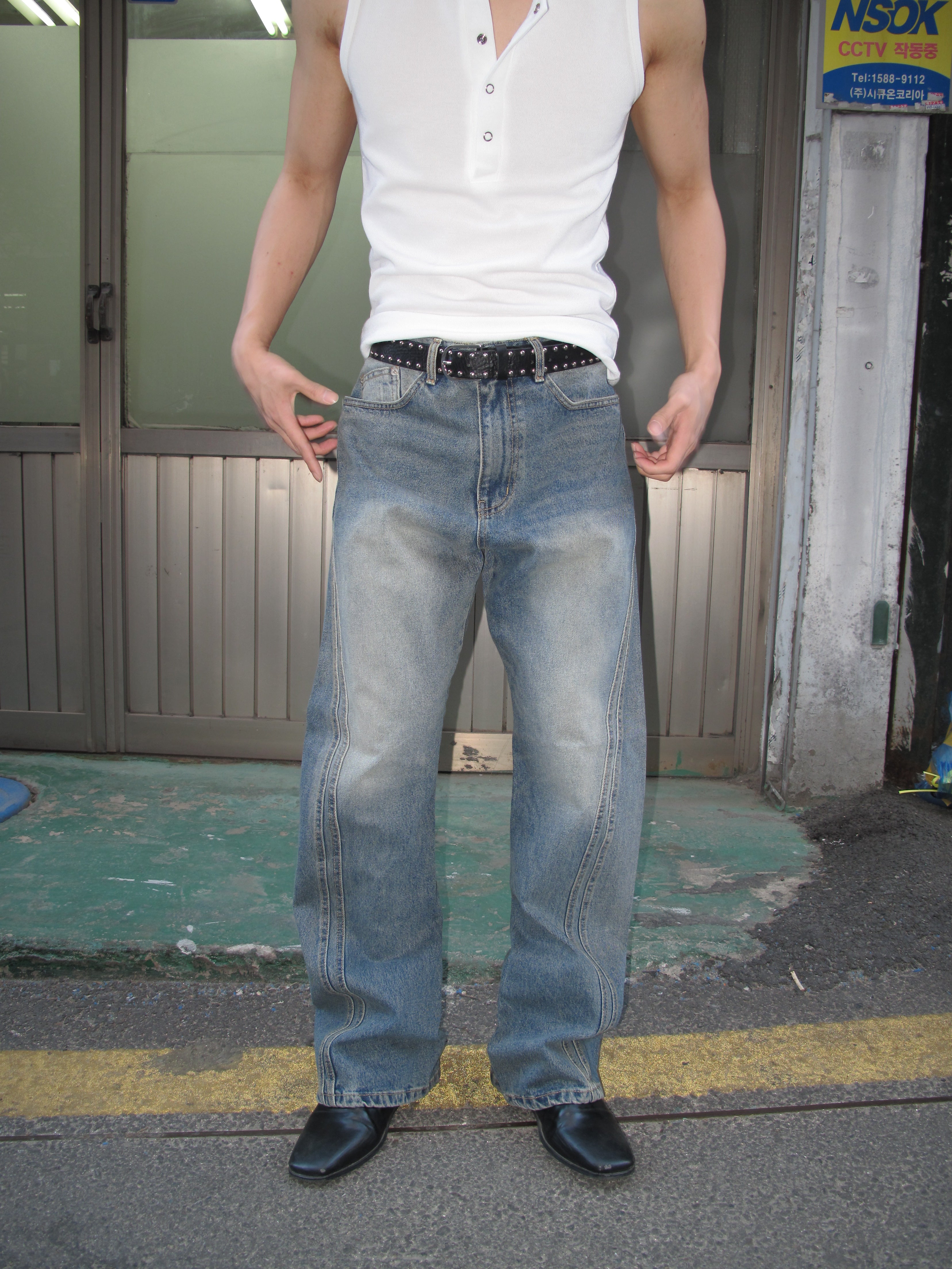 Curved-Seam Washed Flare Jeans