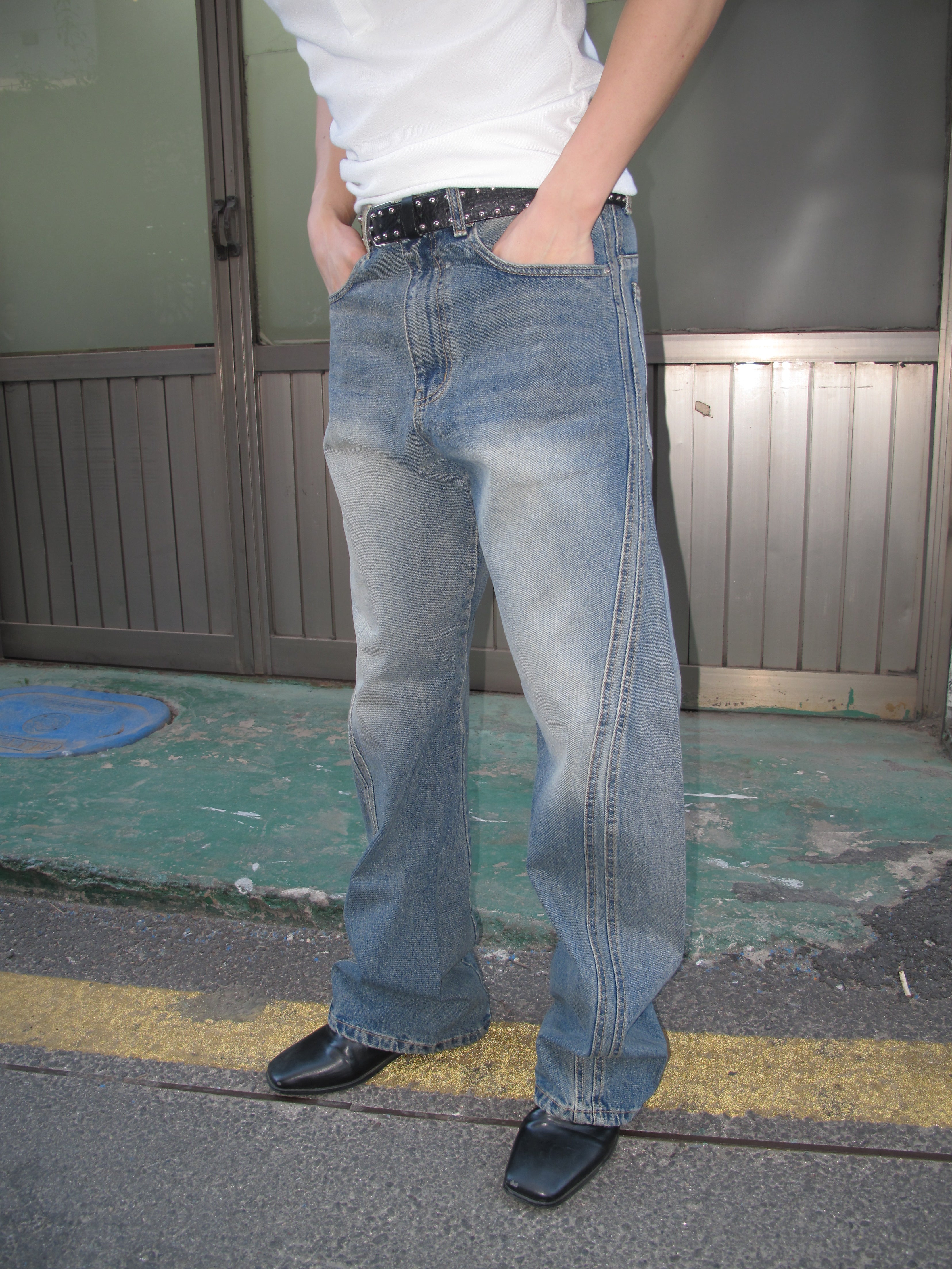Curved-Seam Washed Flare Jeans