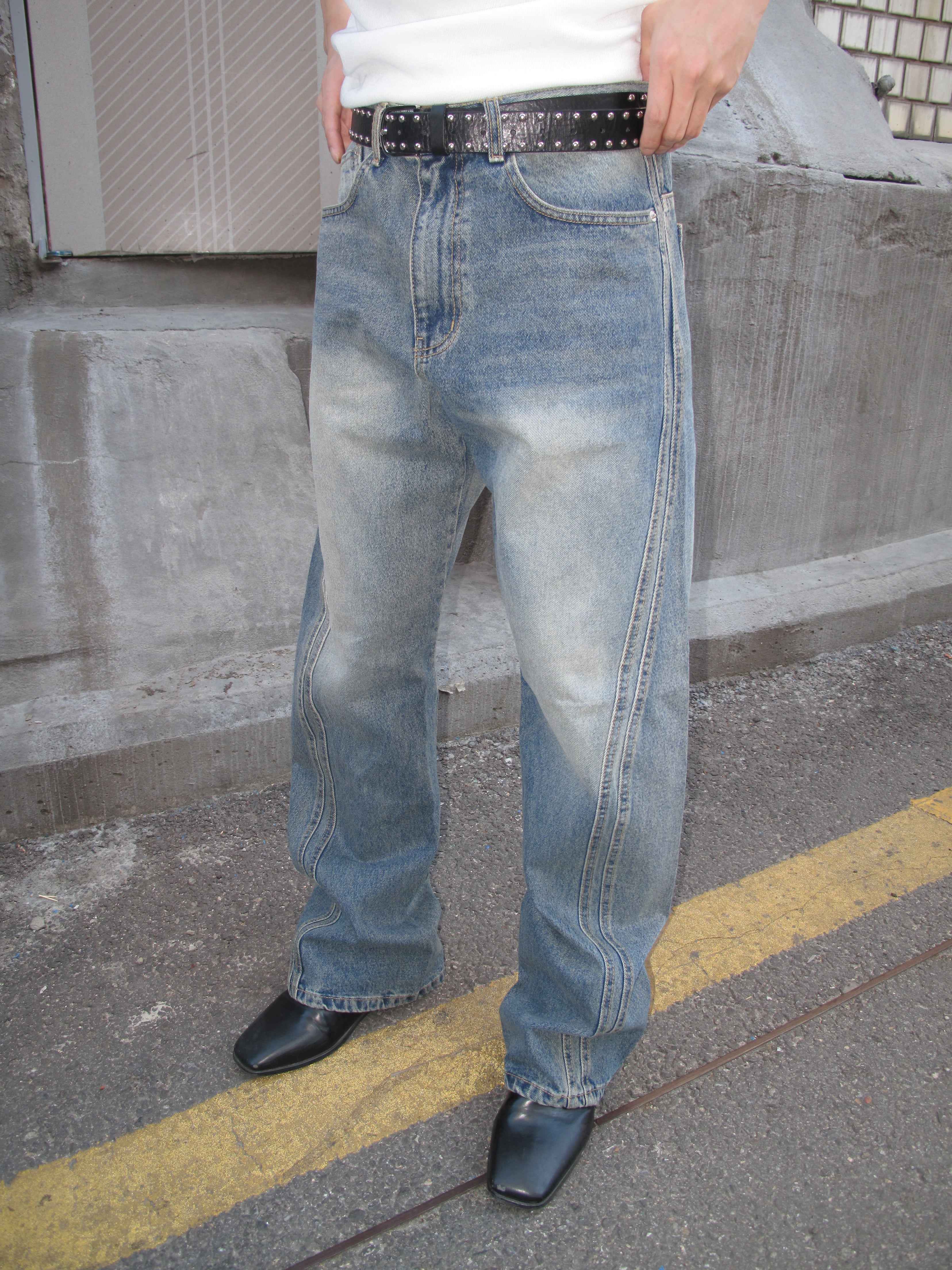 Curved-Seam Washed Flare Jeans