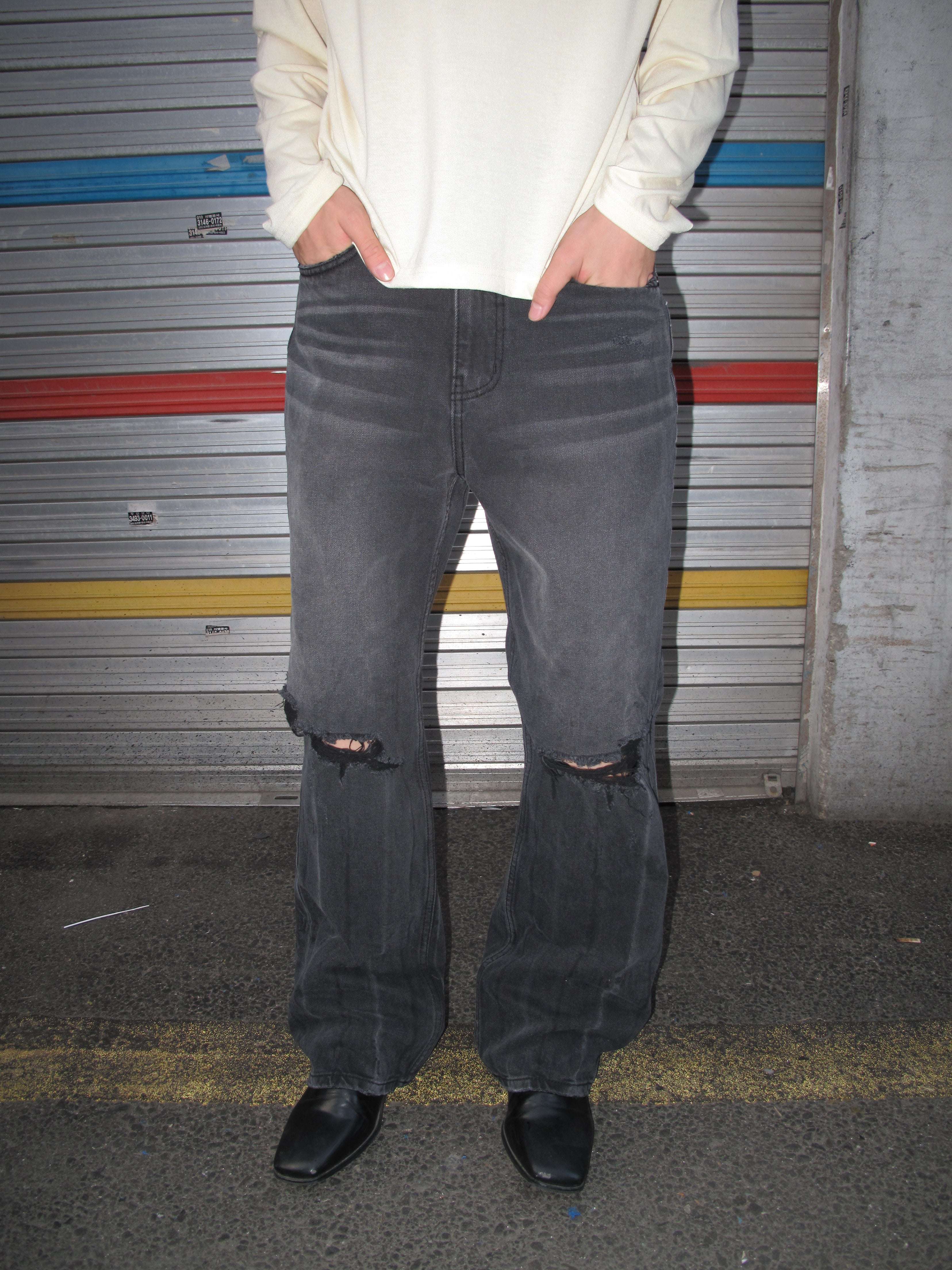Distressed Washed Black Wide-Flare Jeans