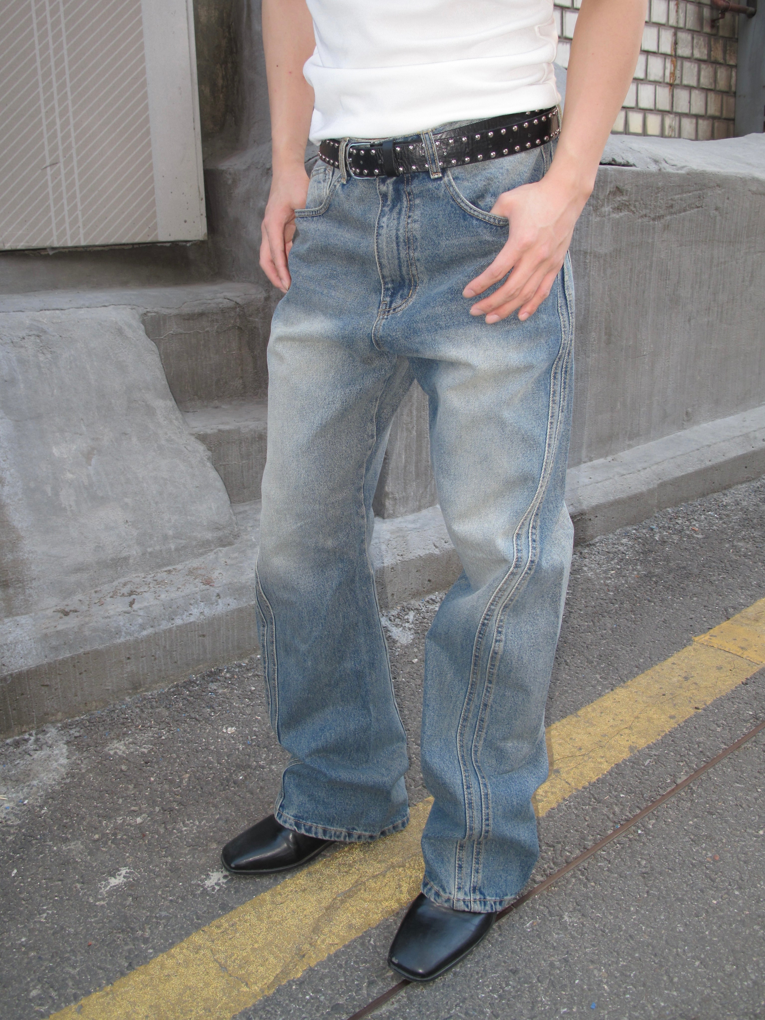 Curved-Seam Washed Flare Jeans