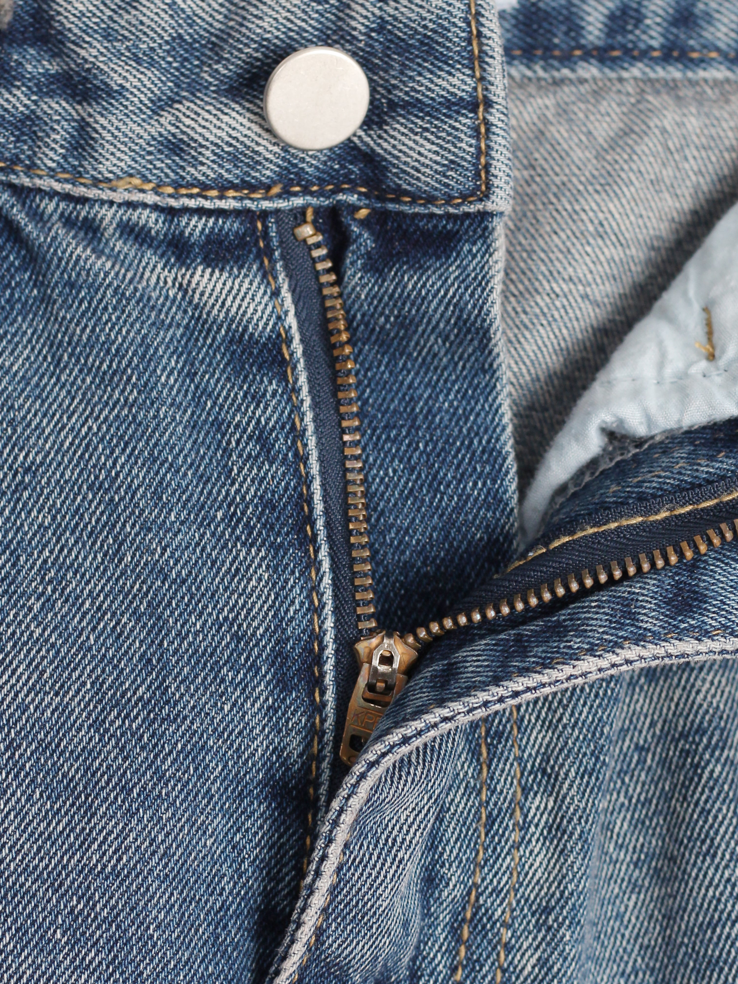 Curved-Seam Washed Flare Jeans