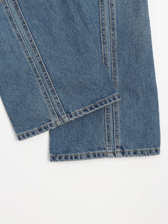 Curved-Seam Washed Flare Jeans