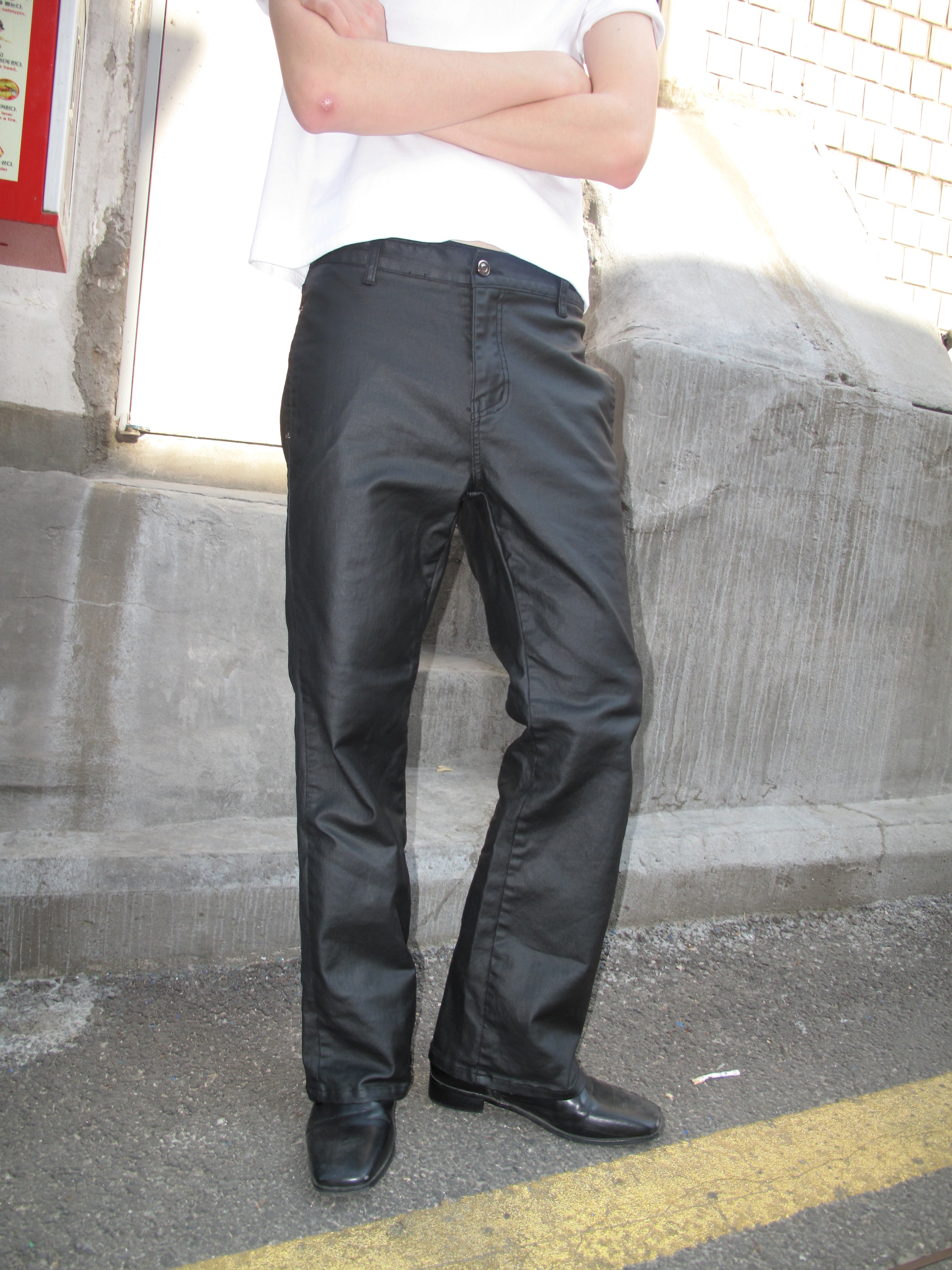 Coated Black Slim-Flare Jeans